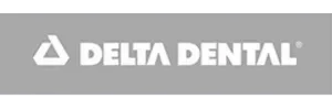 A delta dental logo on a gray background