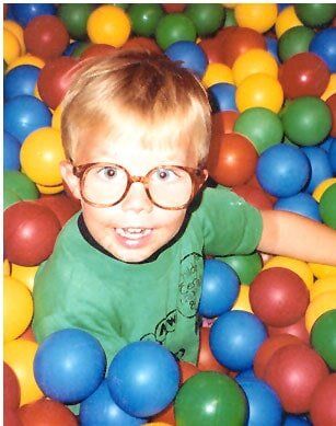 Boy playing colorful balls — Children's Center in Lakewood,, CA