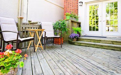 Garden Arrangement — Deck with Beautiful Flowers in Dawsonville, GA