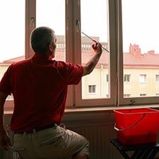 Man Wiping Windows — Butlers in Washington, PA