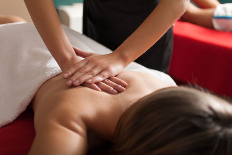 A woman is getting a massage at a spa.