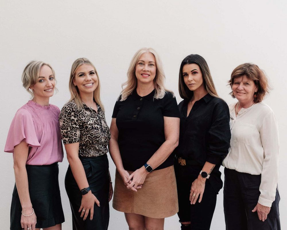 A Group Of Women Are Posing For A Picture Together — Tailored Support Services Pty Ltd In Maroochydore, QLD