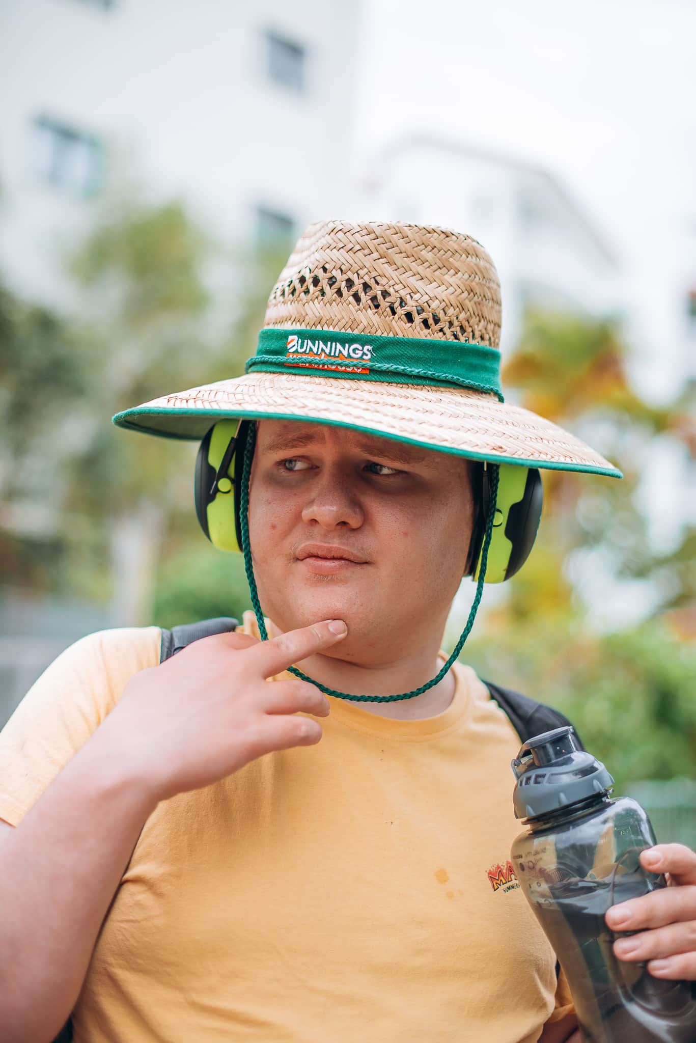 A Man Wearing A Hat And Headphones — Tailored Support Services Pty Ltd In Maroochydore, QLD
