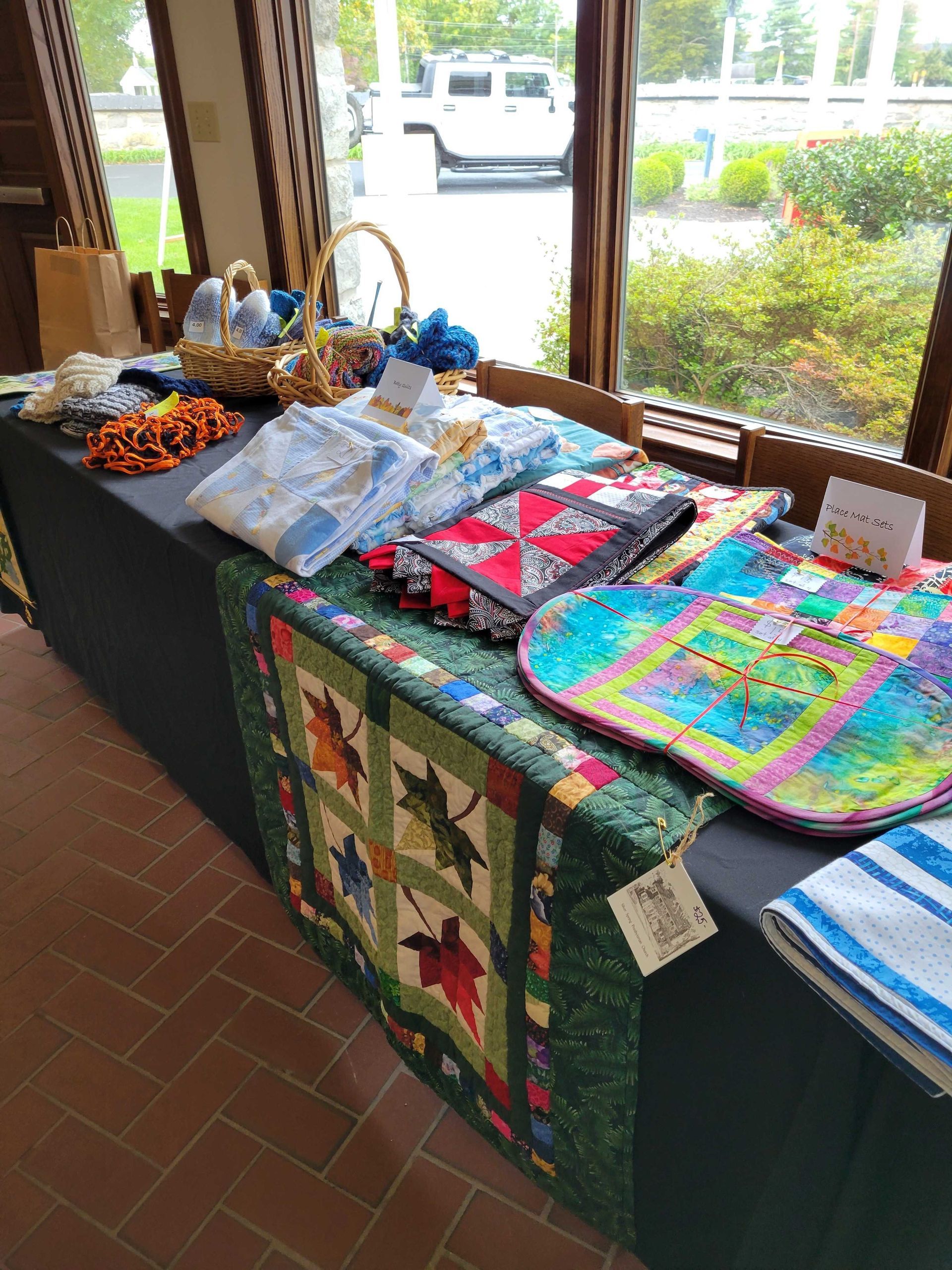 Quilted crafts on table