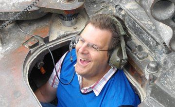 very happy man in a tank