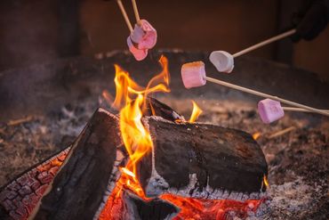 Toasting a marshmallow over an open flame