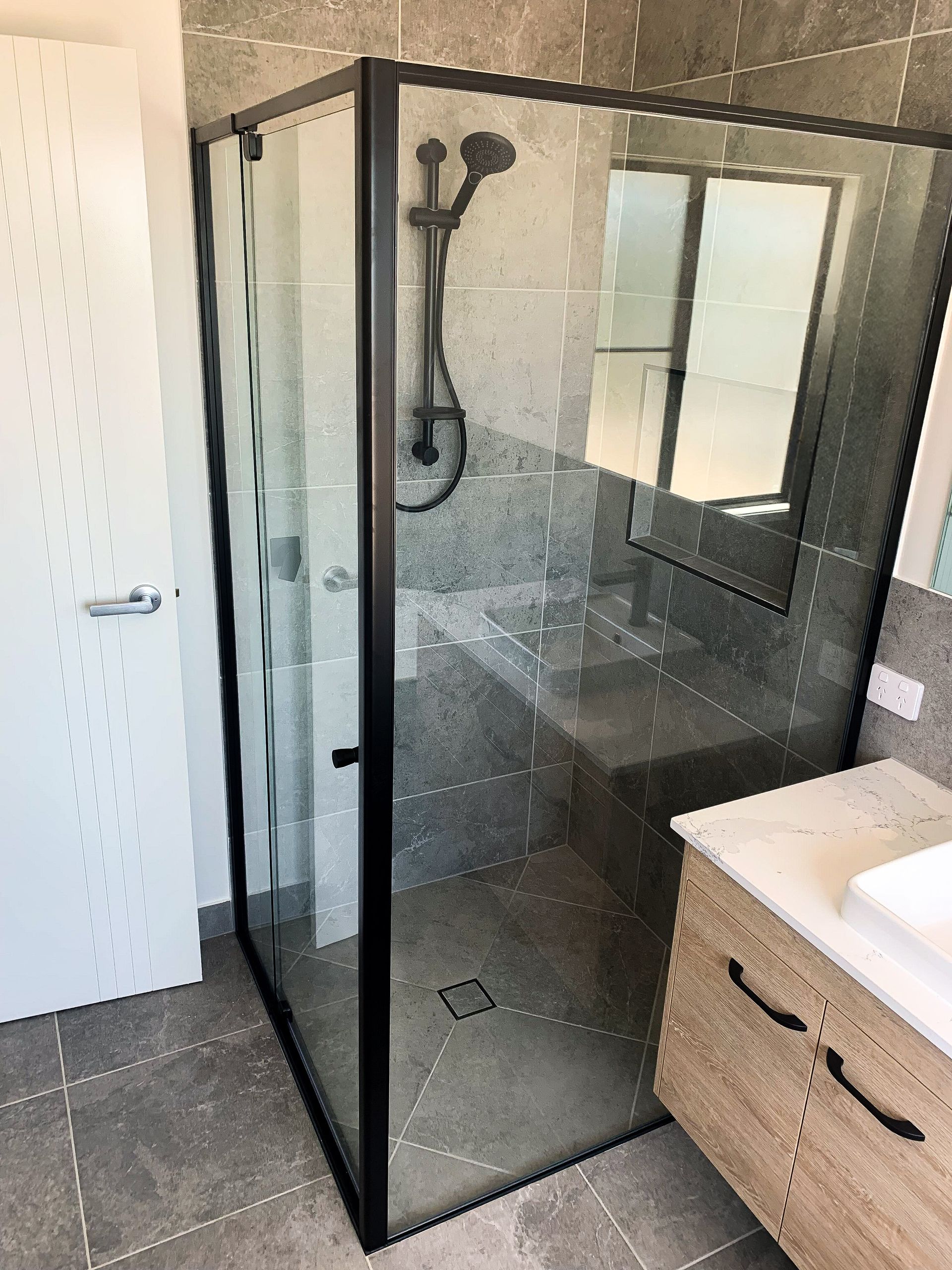 Bathroom With Tiled Walls — Local Glaziers in Eton, QLD