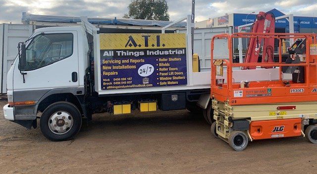 Truck and Lifting Equipment — Roller Doors Installation in Rural View, QLD