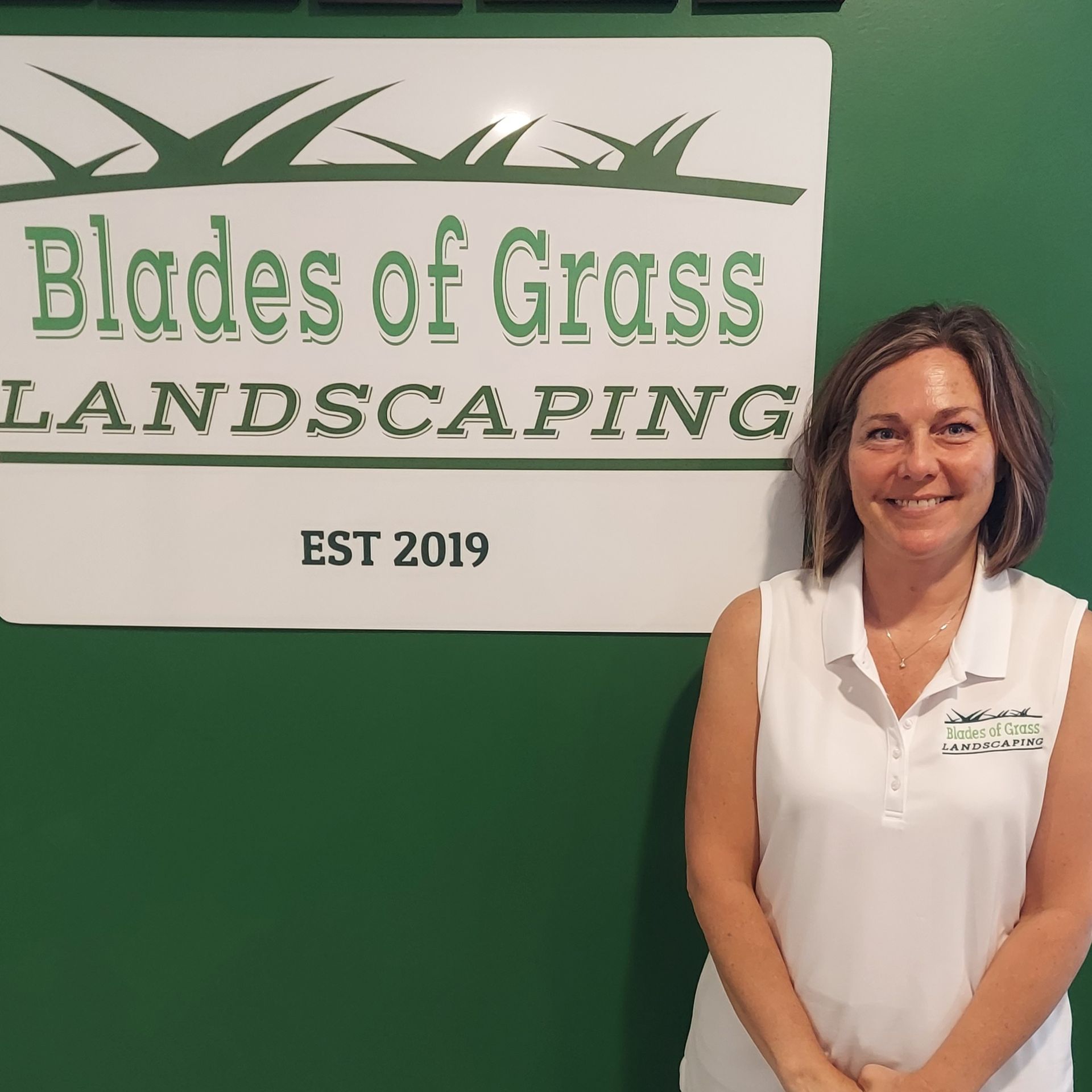 Woman standing in front of a 