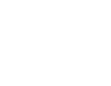 A modern, bright kitchen featuring a large white island with marble countertops, wooden bar stools, and minimalist decor.