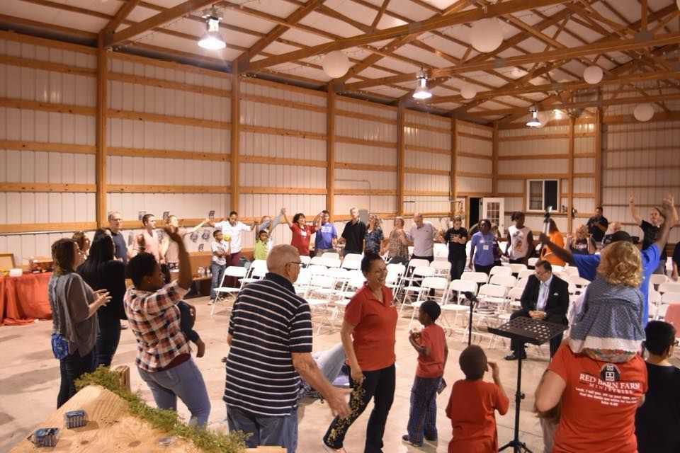 People gathered in a large open building