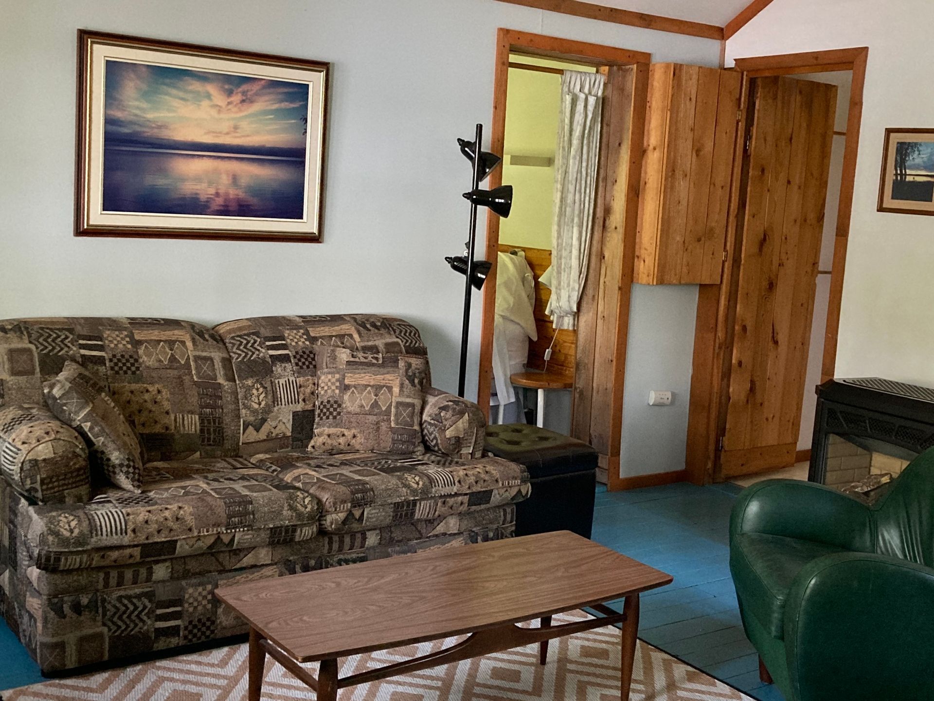 A living room with a couch and a coffee table