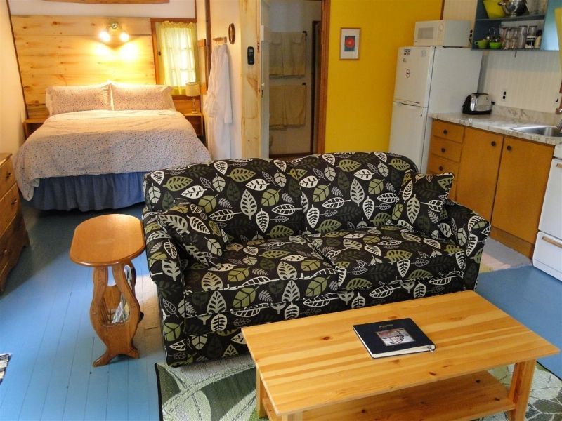 A living room with a couch and a coffee table