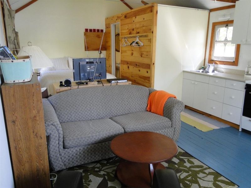 A living room with a couch and a table