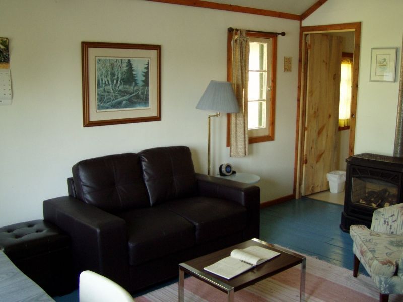 A living room with a couch and a coffee table