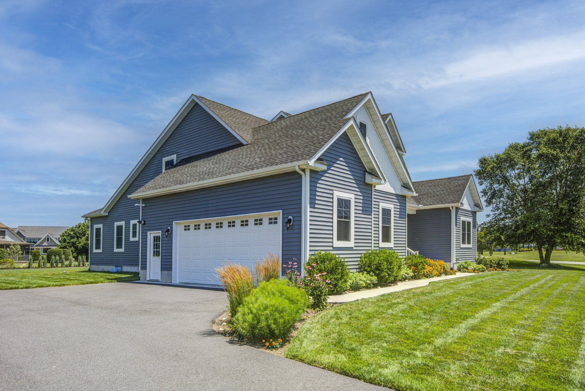 Grey home exterior with garage detail | Bay to Beach Builders | Greenwood, DE 19950