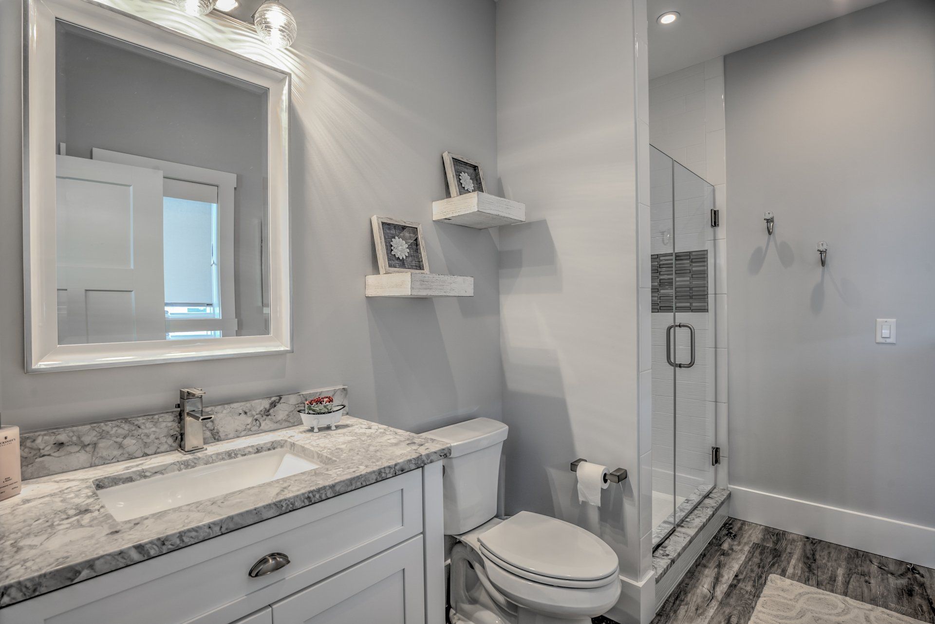 Bathroom vanity with white countertop | bathrooms | Bay to Beach Builders | Greenwood, DE 19950
