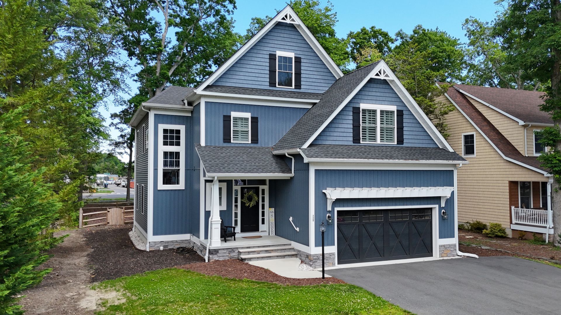 Blue home with black accents