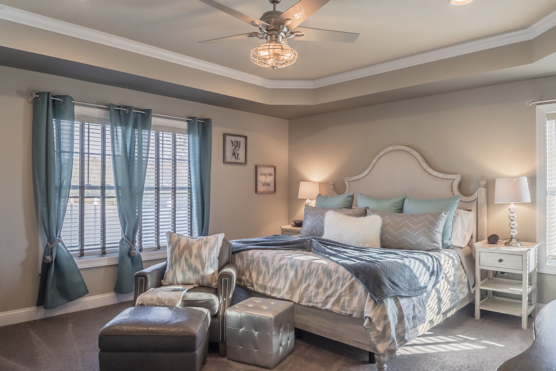 Master bedroom with bed and ceiling treatment | Bay to Beach Builders | Greenwood, DE 19950