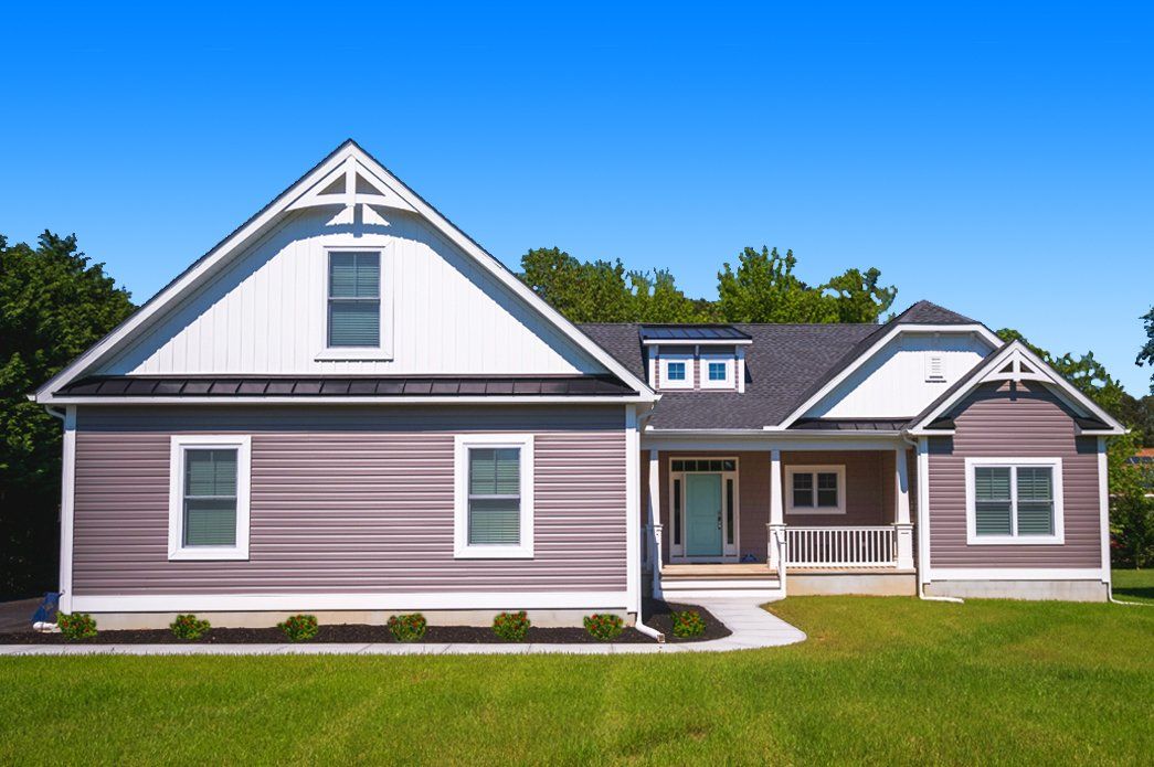 Tan home exterior | Exteriors | Bay to Beach Builders | Greenwood, DE 19950