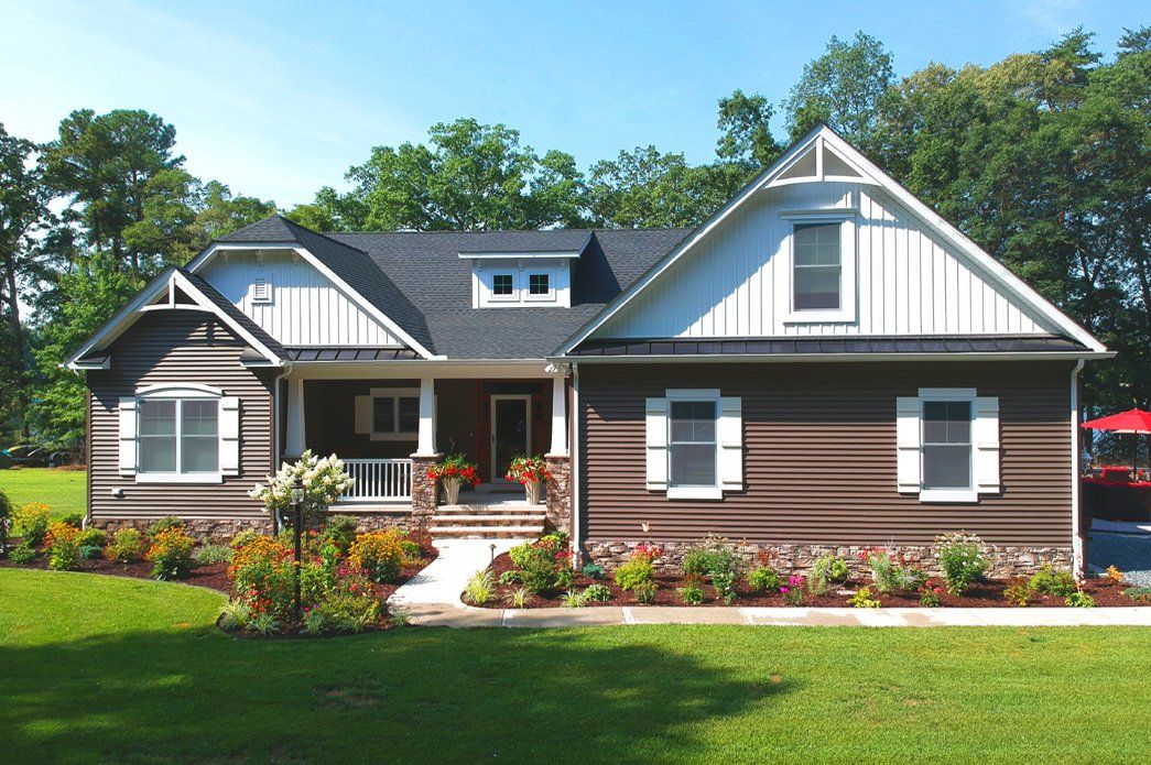 Brown home exterior with large porch | Exteriors | Bay to Beach Builders | Greenwood, DE 19950