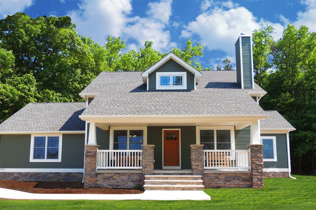 Grey home exterior with brick | Exteriors | Bay to Beach Builders | Greenwood, DE 19950