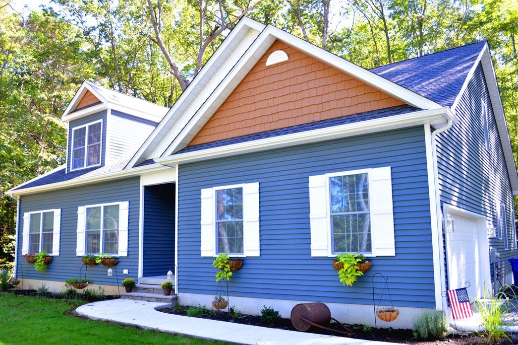 Blue home exterior | Exteriors | Bay to Beach Builders | Greenwood, DE 19950