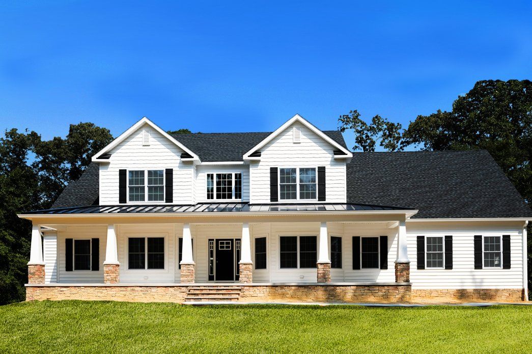 White home exterior with large porch | Exteriors | Bay to Beach Builders | Greenwood, DE 19950