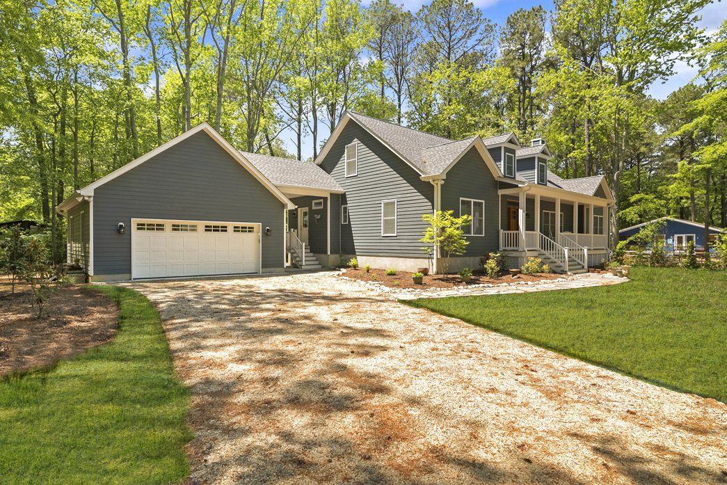 Grey home exterior with garage | Exteriors | Bay to Beach Builders | Greenwood, DE 19950