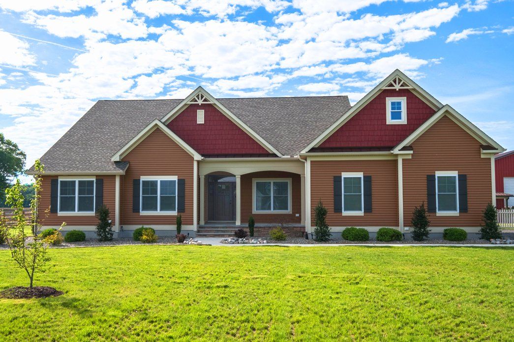 Red home exterior | Exteriors | Bay to Beach Builders | Greenwood, DE 19950