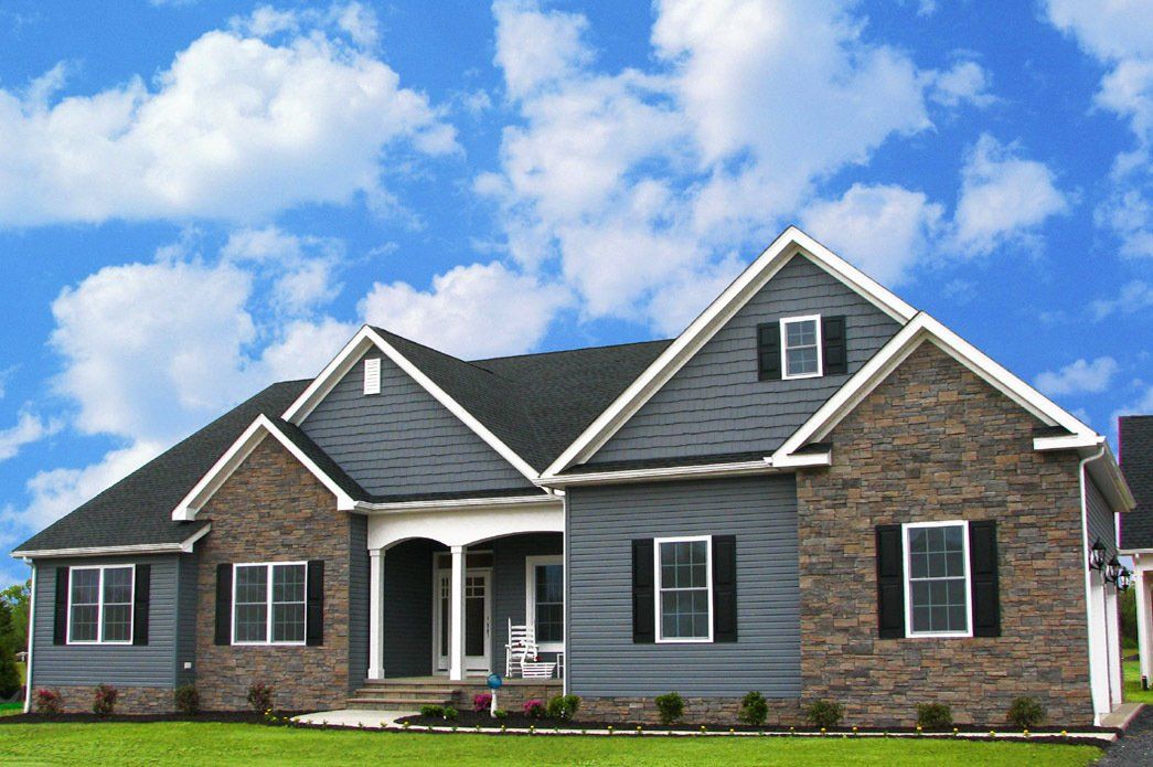 Grey home exterior with brick | Exteriors | Bay to Beach Builders | Greenwood, DE 19950