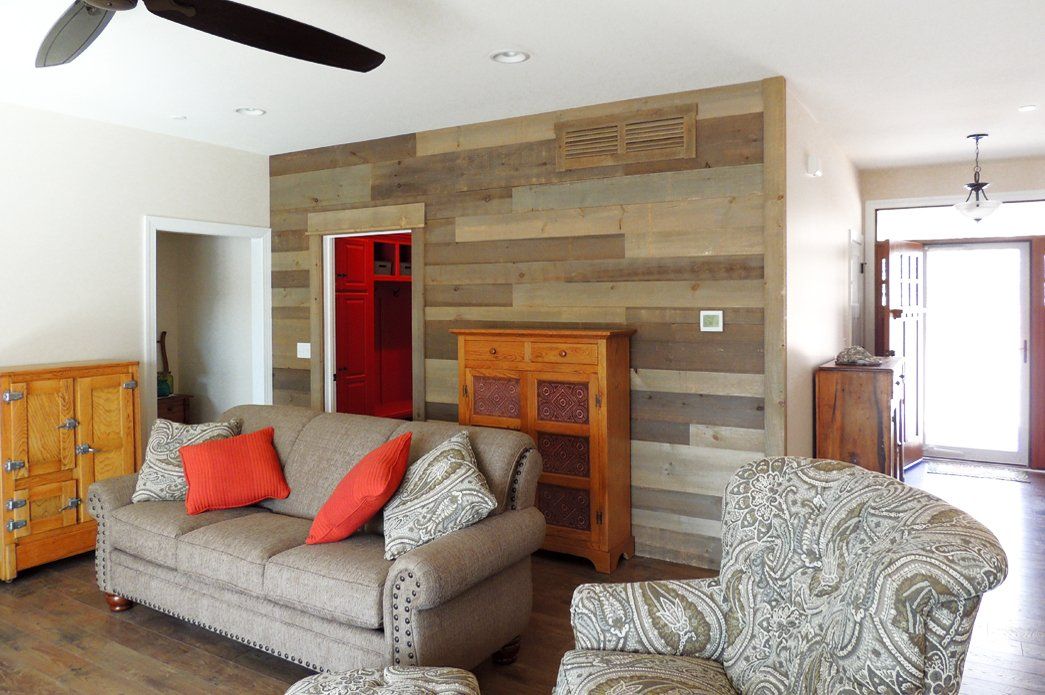 Spacious living room with shiplap wall accent | Bay to Beach Builders | Greenwood, DE 19950