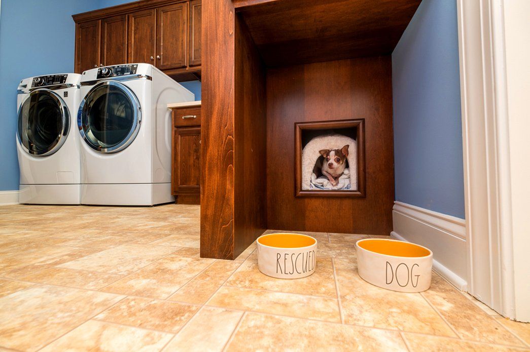 Utility room with cabinetry and pet area | Interiors | Bay to Beach Builders | Greenwood, DE 19950