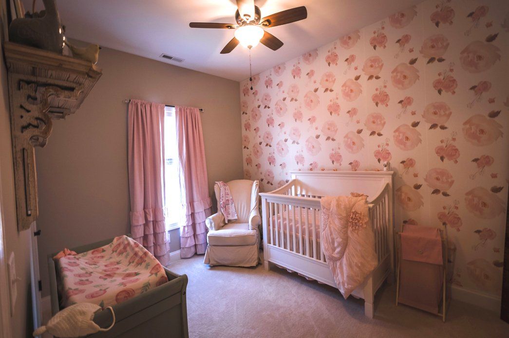 Pink Bedroom with crib and nursery | Bay to Beach Builders | Greenwood, DE 19950