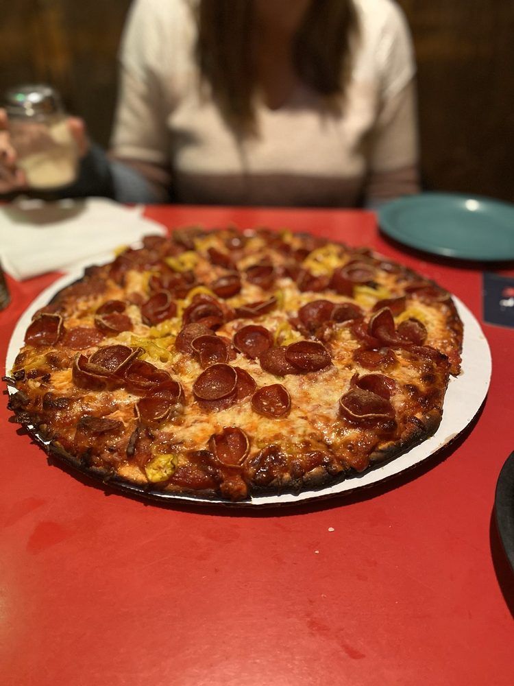 Pizza On Table — Columbus, OH — Plank's Cafe & Pizzeria
