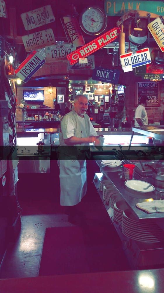 Man Serving On Pizzeria — Columbus, OH — Plank's Cafe & Pizzeria