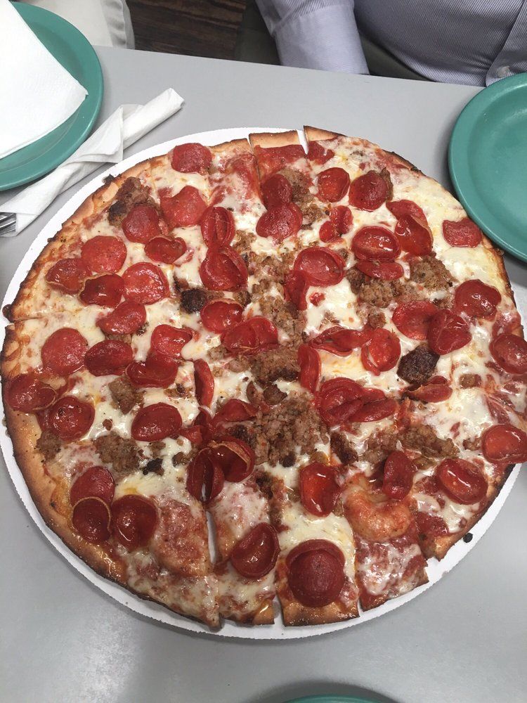 Square Cut Fresh Delicious Pepperoni Pizza — Columbus, OH — Plank's Cafe & Pizzeria
