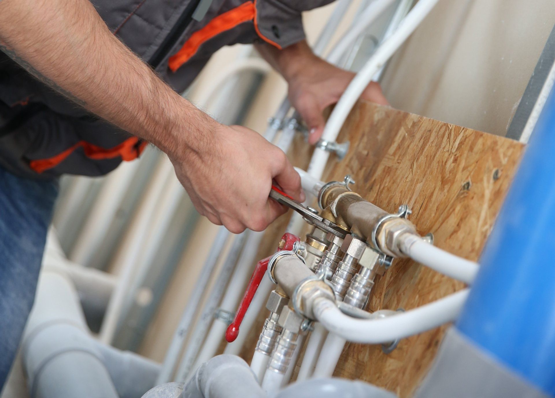 commercial plumber installing drain lines