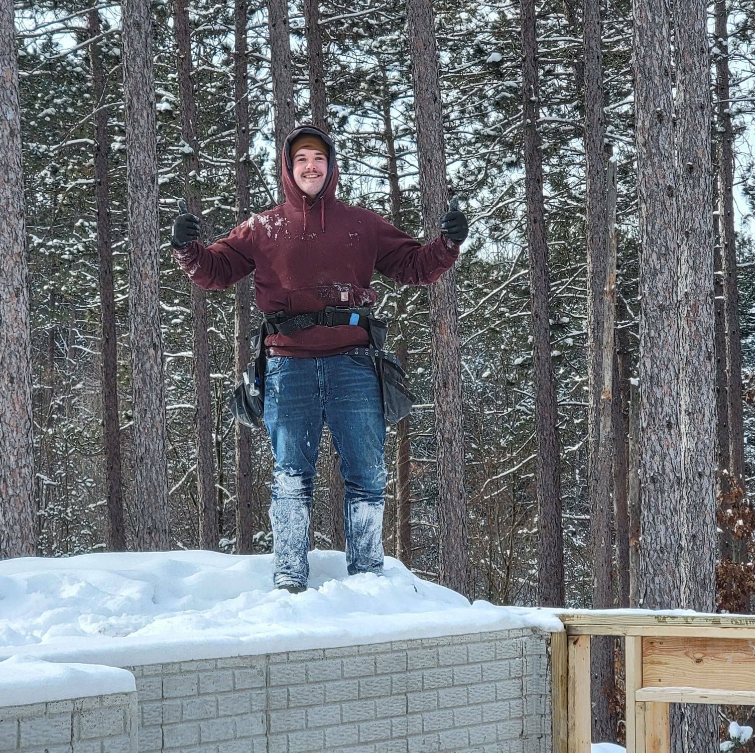 man standing in the snow