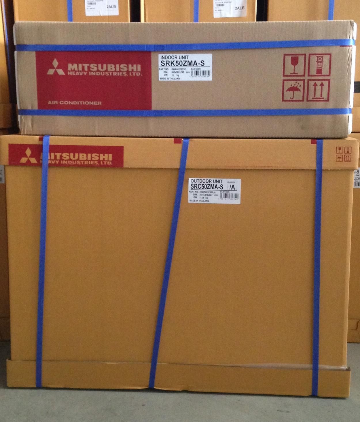 Two Boxes Of Mitsubishi Air Conditioners Are Stacked On Top Of Each Other — Custom Air In East Albury, NSW