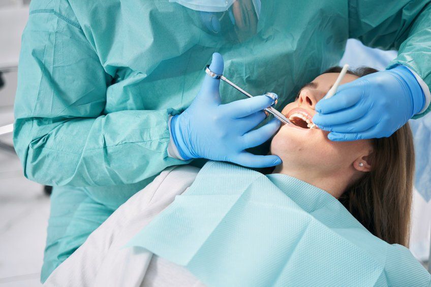 oral sedation dentistry dentist giving patient highlands ranch office