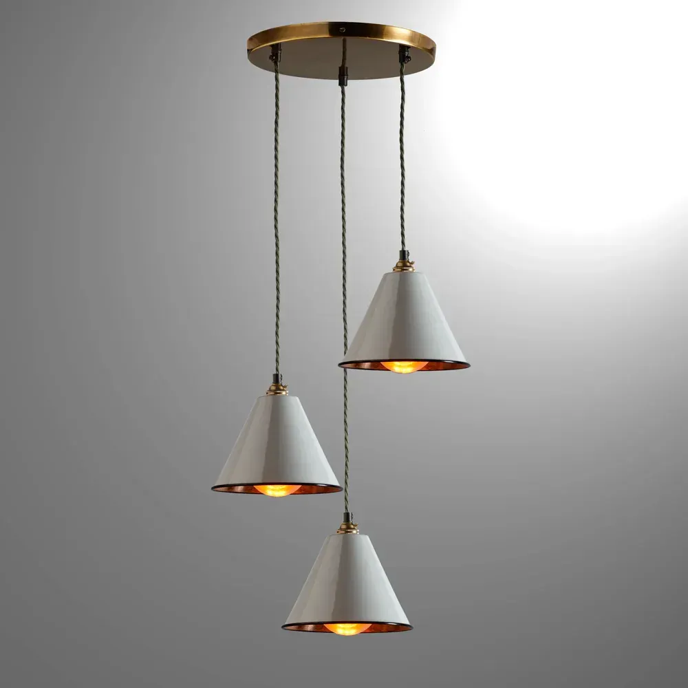 Light fixture featuring 3 suspended lamps.