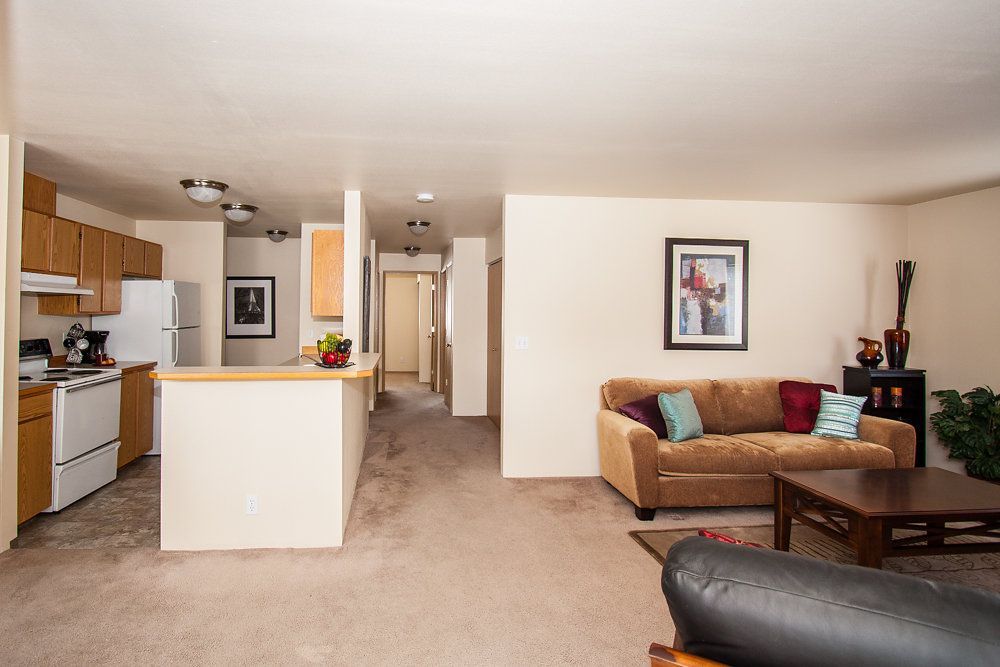 a living room with a couch and a coffee table