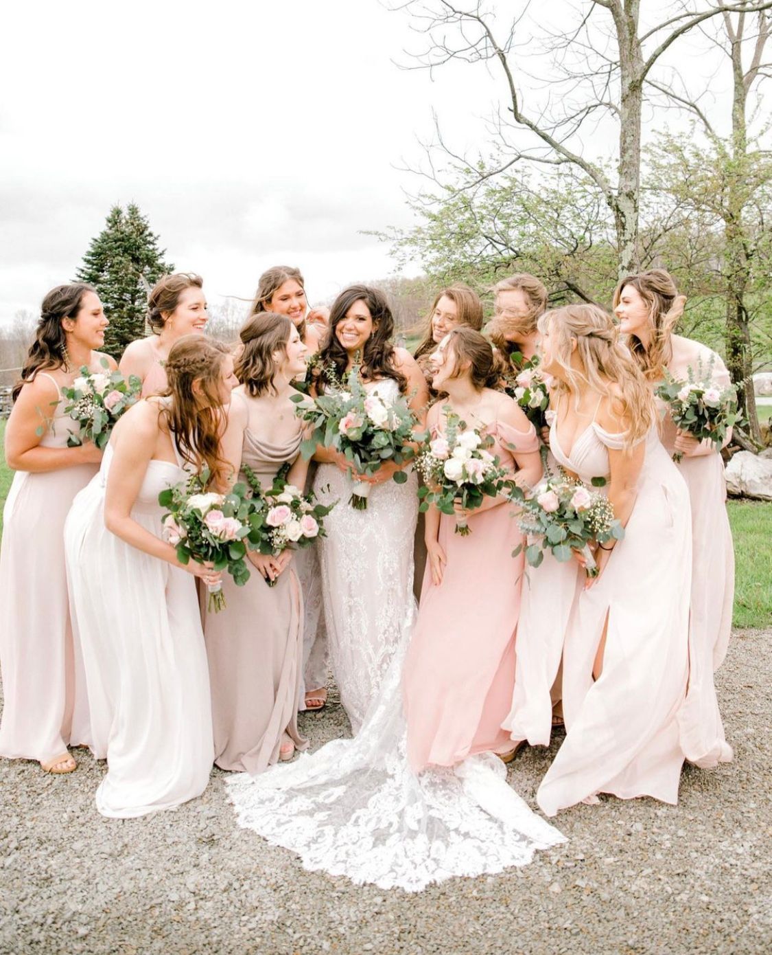 a bride and her bridesmaids are posing for a picture together . natural wedding makeup. pittsburgh, pa. bridal makeup. bridal mua. wedding makeup artist. moriah e beauty. meredith brooke photography.