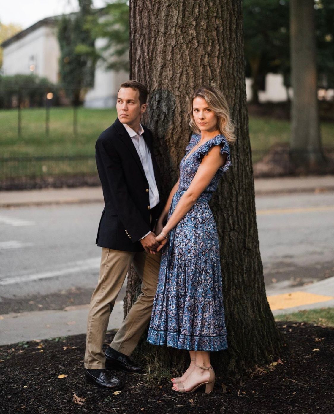 a man and a woman are standing next to a tree holding hands . natural wedding makeup. pittsburgh, pa. bridal makeup. bridal mua. wedding makeup artist. moriah e beauty. steven dray photography.