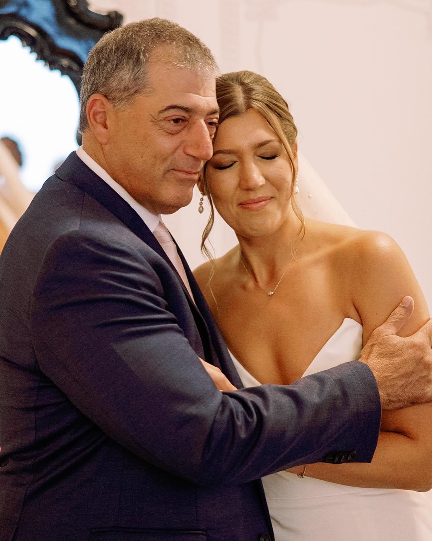 a man in a suit and tie is hugging a woman in a white dress. natural wedding makeup. pittsburgh, pa. bridal makeup. bridal mua. wedding makeup artist. moriah e beauty. sarah mccloskey photography.