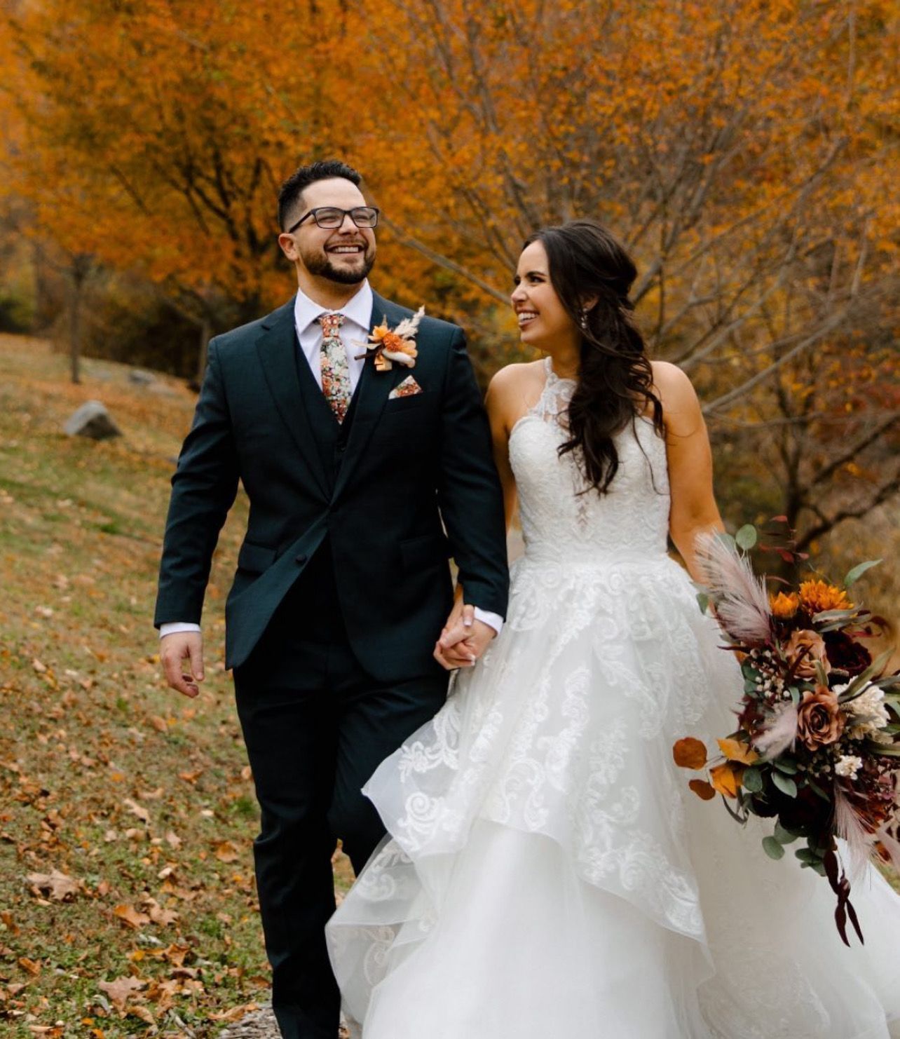 a bride and groom are walking through a field holding hands . natural wedding makeup. pittsburgh, pa. bridal makeup. bridal mua. wedding makeup artist. moriah e beauty. alexa frankovitch photography.