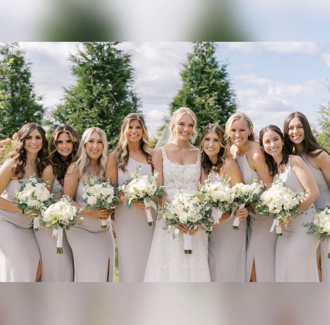 a bride and her bridesmaids are posing for a picture while holding bouquets of flowers . natural wedding makeup. pittsburgh, pa. bridal makeup. bridal mua. wedding makeup artist. moriah e beauty. anna laero photography.