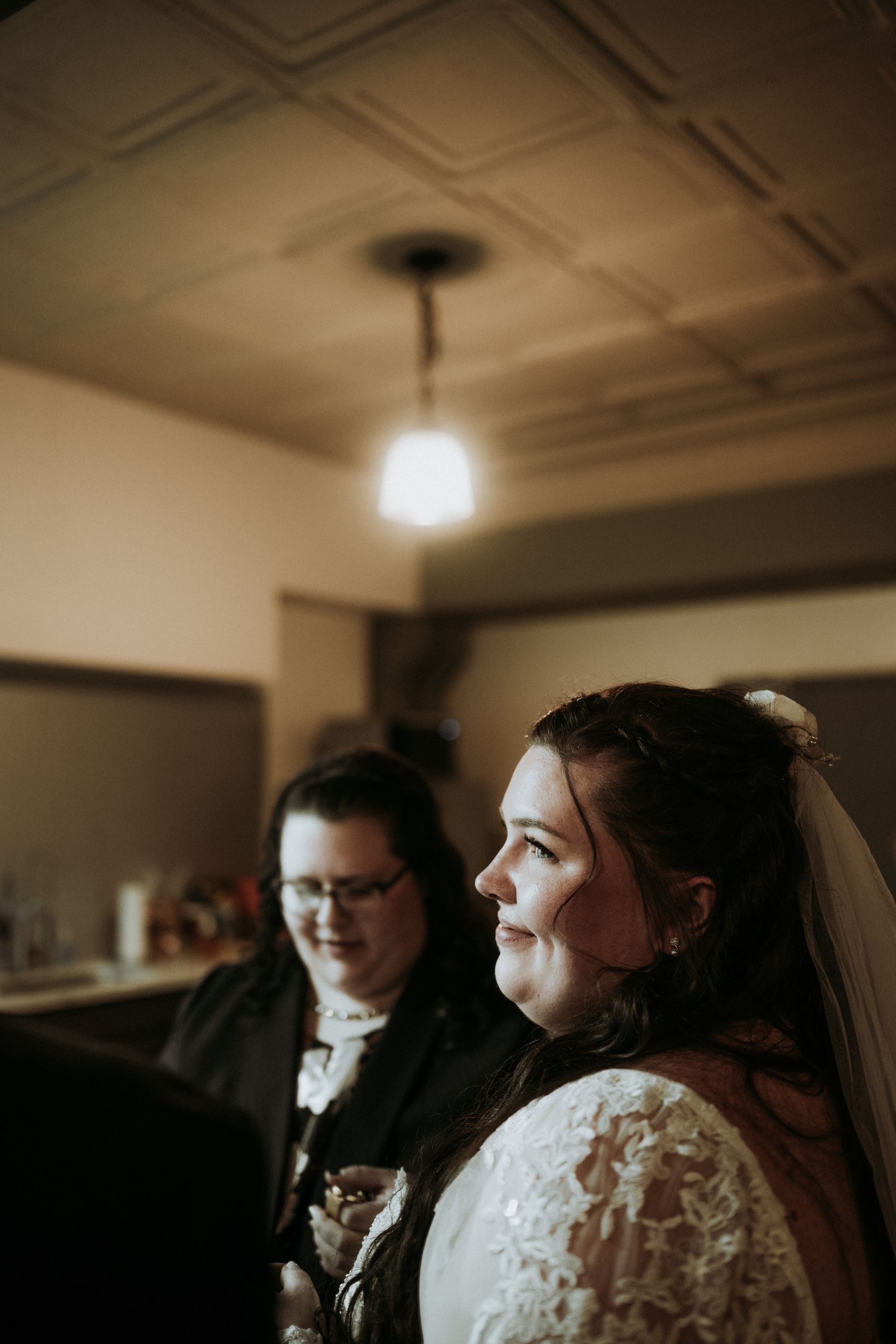 two brides take a moment before their ceremony. natural wedding makeup. pittsburgh, pa. bridal makeup. bridal mua. wedding makeup artist. moriah e beauty. carlie gabrelcik photography.