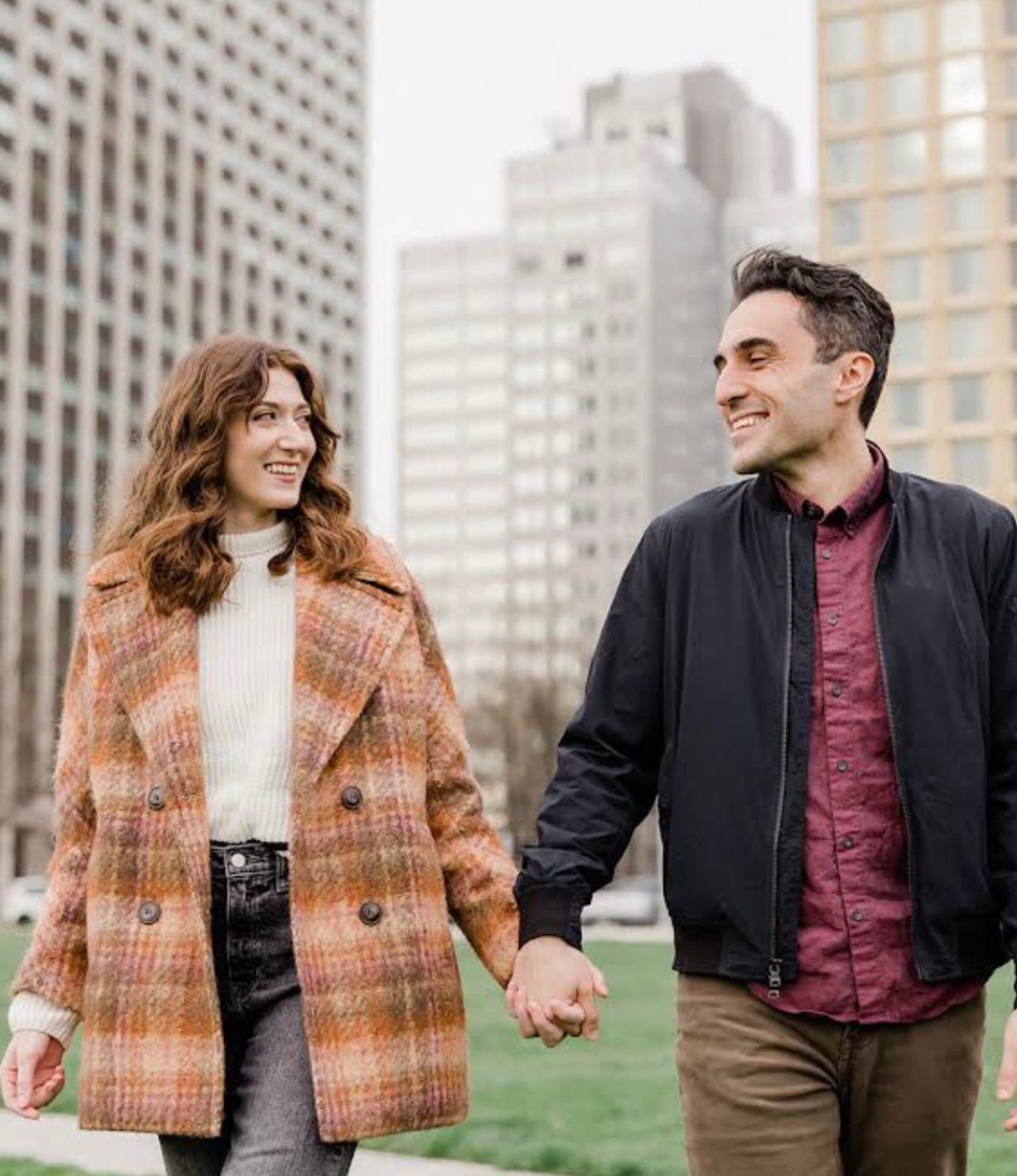 a man and a woman are walking down a sidewalk holding hands . natural wedding makeup. pittsburgh, pa. bridal makeup. bridal mua. wedding makeup artist. moriah e beauty. loren demarco photography.